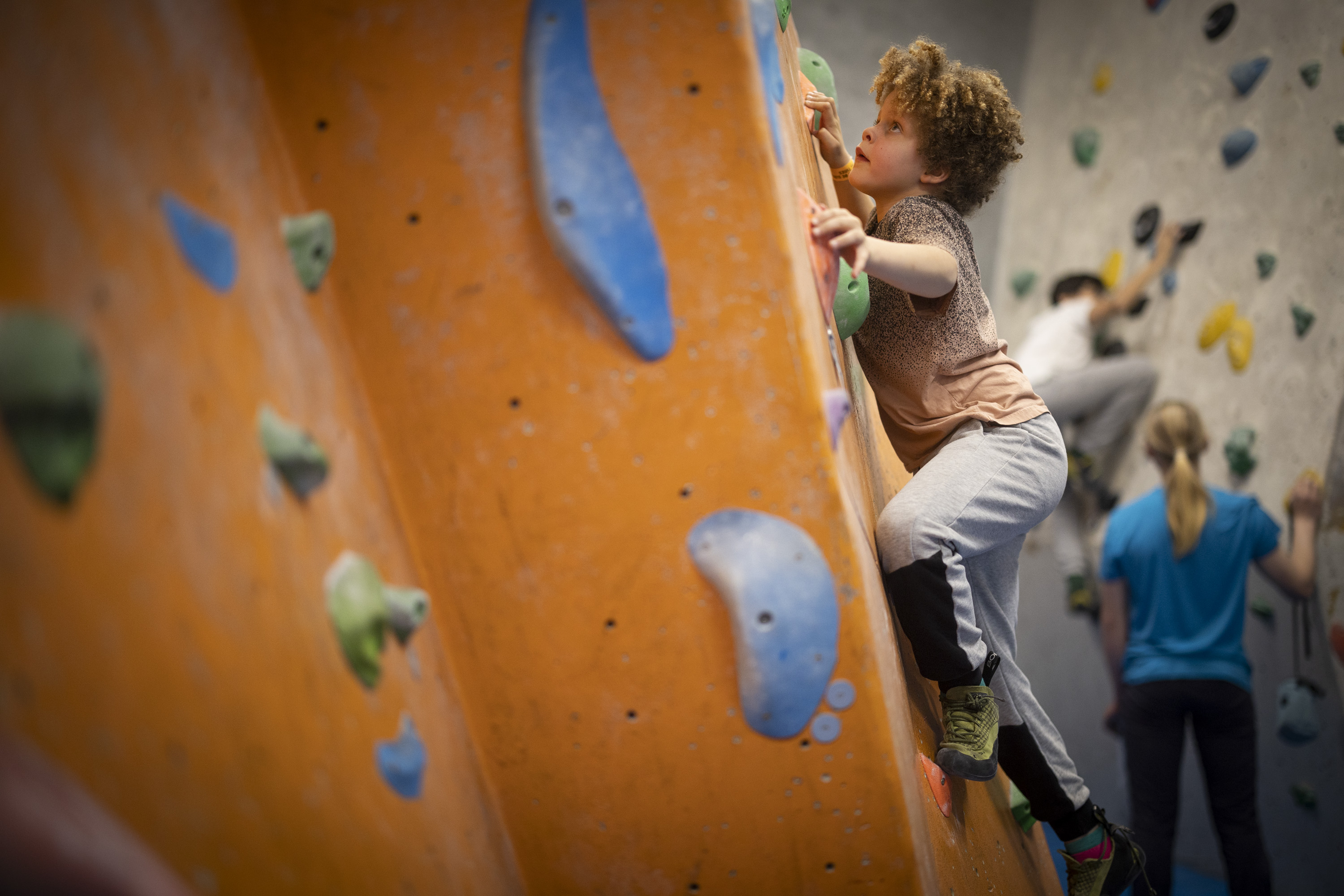 Young children climbing at The Reach